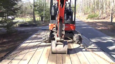 proper way chain down mini excavator|chain down trailer tie downs.